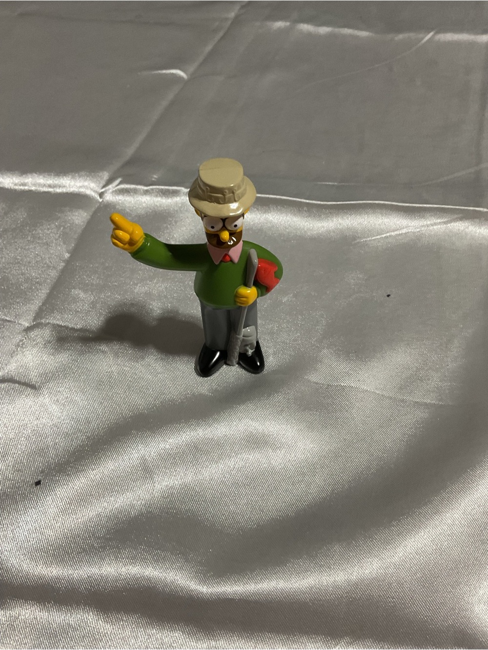 Vintage Cartoon Gentleman Figurine in Green Sweater
